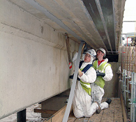 Structural Strengthening of Reinforced Concrete Structures with Long Lengths of Fully Bonded Carbon Fibre Plate NCC